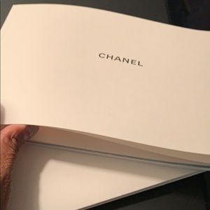 Classic Chanel bag with flap in black. Authentic.